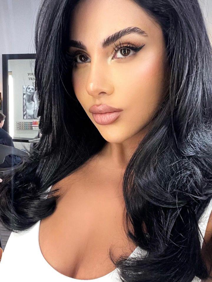 Woman's selfie with a fresh butterfly haircut done at the top-rated salon in Pembroke Pines and Davie, Hair Culture Day Spa