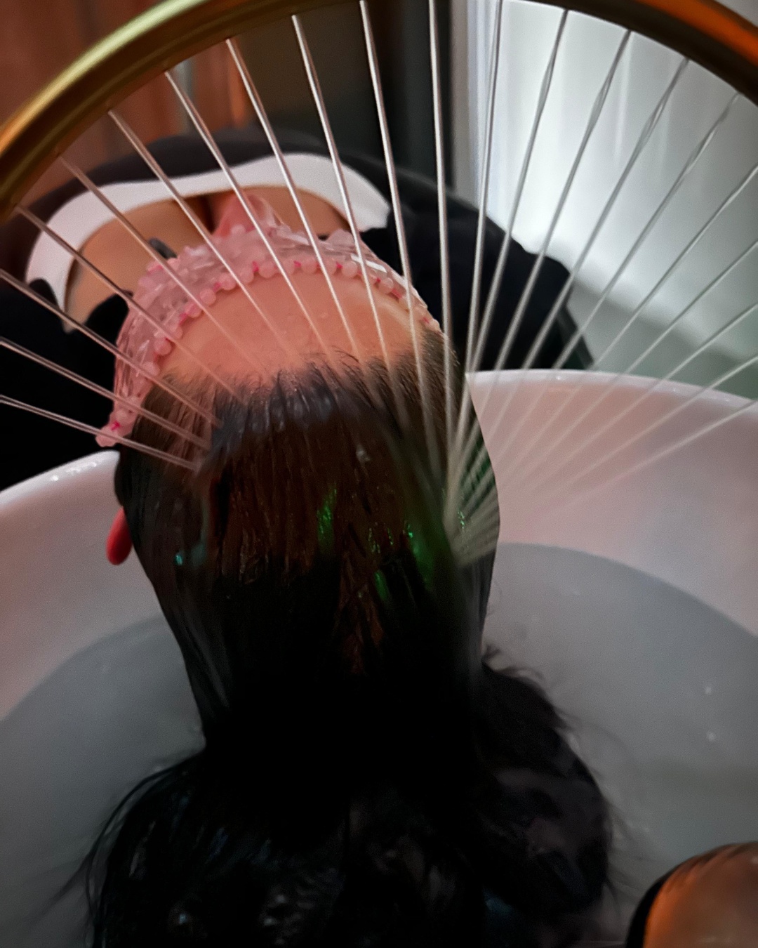 Shot of a Head Spa Treatment for scalp care and relaxation with overhead waterfall at Hair Culture Day Spa hair wellness salon in Pembroke Pines