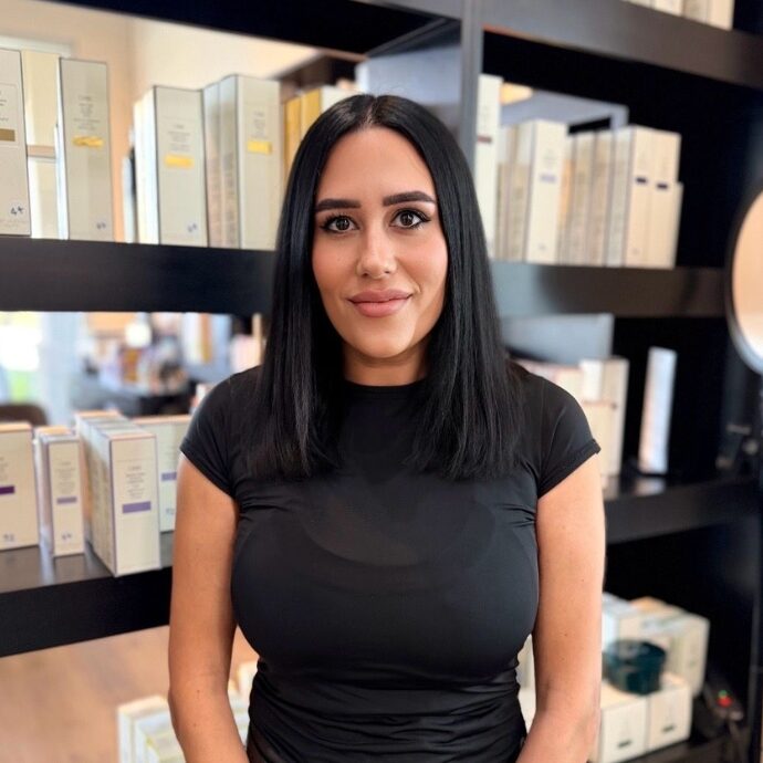 Portrait of Carly Dadon, Master Stylist at Hair Culture Day Spa in Pembroke Pines offering balayage, highlights, extensions, and customized haircuts.