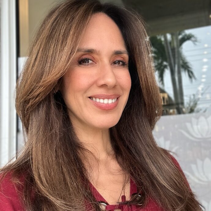 Wendy Matovelle, Owner and Master Stylist at Hair Culture Day Spa, a top-rated salon in Pembroke Pines specializing in blonding, balayage, highlights, and precision haircuts for long or short styles.
